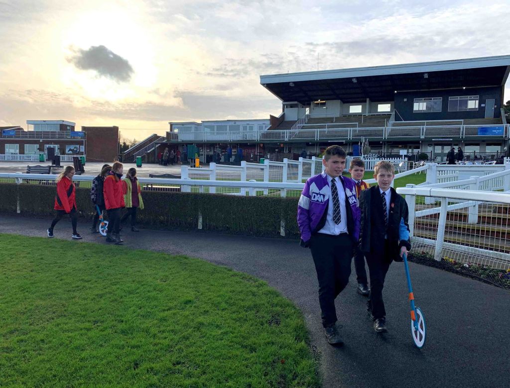 Students measuring the parade ring