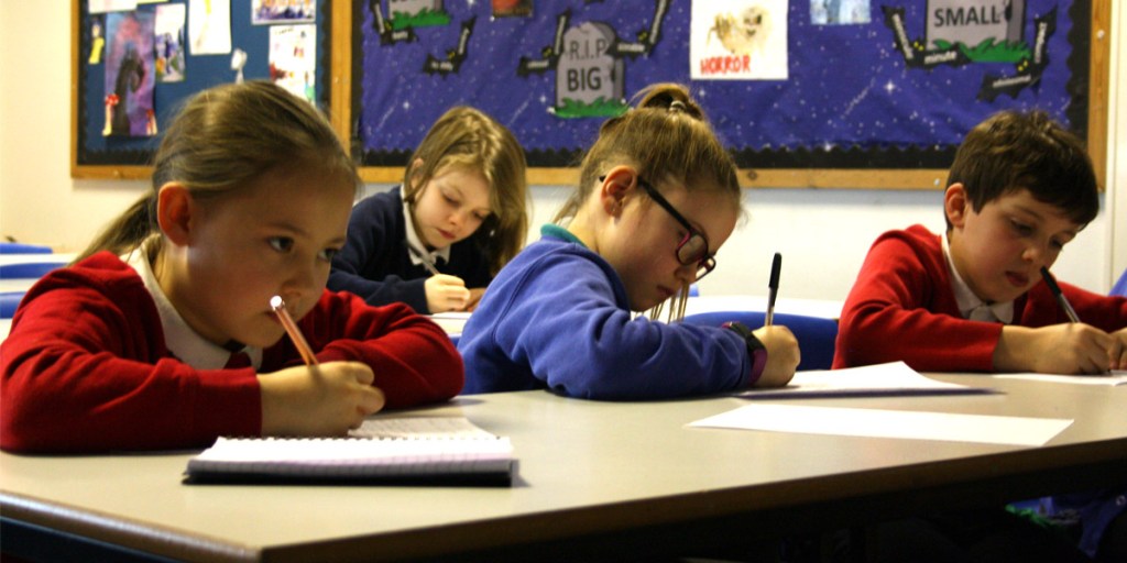Pupils writing poetry