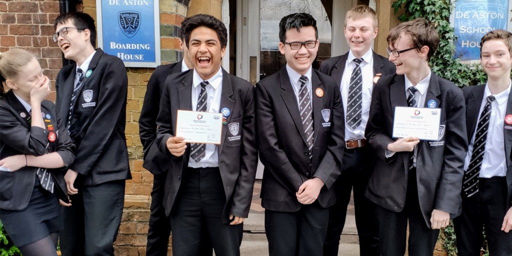 Year 10 De Aston students with their Maths Feast certificates.